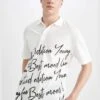 DeFacto Boxy Fit Short Sleeve Slogan Print Shirt 1 DeFacto Boxy Fit Short Sleeve Slogan Print Shirt -Active Fashion Store 1 zoom desktop 1113