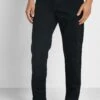 Marks & Spencer Mid Wash Tapered Fit Jeans -Active Fashion Store 1 zoom desktop 959