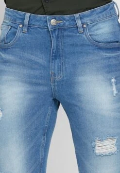 Rip And Repair Tapered Fit Jeans -Active Fashion Store 4 zoom desktop 1034