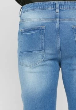 Rip And Repair Tapered Fit Jeans -Active Fashion Store 5 zoom desktop 503