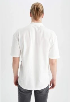 DeFacto Boxy Fit Short Sleeve Slogan Print Shirt -Active Fashion Store 5 zoom desktop 525